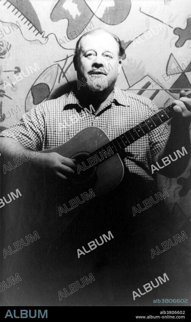 Burl Icle Ivanhoe Ives (June 14, 1909 - April 14, 1995) was an American actor, writer, and folk singer. In the early 1930s he traveled about America as an itinerant singer playing his banjo. In 1940, he began his own radio show, The Wayfaring Stranger. Over the next decade, he popularized several traditional folk songs, such as Foggy Dew, Blue Tail Fly, and Big Rock Candy Mountain. In 1942, he was drafted into the Army and joined the cast of Irving Berlin's This Is the Army. In 1950 he was identified in the pamphlet Red Channels and blacklisted as an entertainer with supposed Communist ties. In 1952, he cooperated with HUAC and agreed to testify. His statement to the HUAC ended his blacklisting, allowing him to continue acting in movies. But, it also led to a bitter rift with many folk singers. He won an Academy Award for Best Supporting Actor in 1958 for his role in "The Big Country". In 1994, he was diagnosed with oral cancer. After several unsuccessful operations, he decided against further surgery. He fell into a coma and died from the disease in 1995, at the age of 85. Photographed by Carl Van Vechten, dated May 10, 1955.
