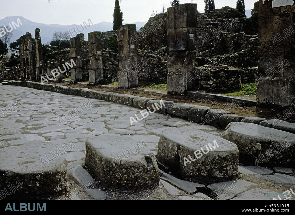 Herculaneum, street with stepping stones. Streets were usually paved with basalt stones; since there was no sewage system, roads were flooded during rainy periods and lava stepping stones were laid for pedestrians to cross.