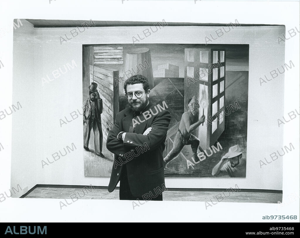 GUILLERMO PÉREZ VILLALTA. Madrid, 01/12/1988. The painter Guillermo Pérez Villalta poses in front of one of his works at the exhibition at the Soledad Lorenzo gallery in Madrid.