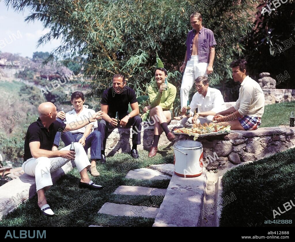 BRAD DEXTER, CHARLES BRONSON, HORST BUCHHOLZ, JAMES COBURN, ROBERT VAUGHN, STEVE MCQUEEN and YUL BRYNNER in THE MAGNIFICENT SEVEN, 1960, directed by JOHN STURGES. Copyright UNITED ARTISTS.