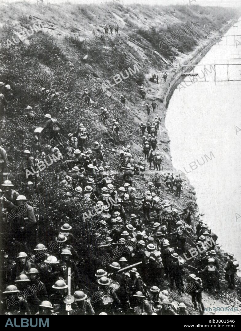 The crossing of the St. Quentin Canal by the men of the 46th Division. The canal was heavily defended by fortified machine gun positions), but they captured 4200 German prisoners (out of a total for the army of 5300). The Battle of St. Quentin Canal was a pivotal battle of WWI that began on September 29, 1918 and involved British, Australian and American forces in the spearhead attack and as a single combined force against the German Siegfried Stellung of the Hindenburg Line. Under the command of Australian general Sir John Monash, the assault achieved all its objectives, resulting in the first full breach of the Hindenburg Line, in the face of heavy German resistance and, in concert with other attacks of the Great Offensive along the length of the line convinced the German high command that the writing was on the wall regarding any hope of German victory.