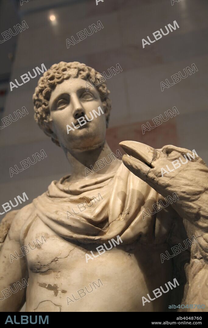 Statue of Ganymede with the Eagle. Roman, after a Greek original from the Praxiteles school of the 3rd century BC. According to Homer, Ganymede was a Trojan prince and the most beautiful of mortals. He was abducted by Zeus, who had assumed the form of an eagle, to be taken to serve as a cup bearer to the Gods in Olympus, in return for which he was granted eternal youth. Found in the collection of The Hermitage, St Petersburg.