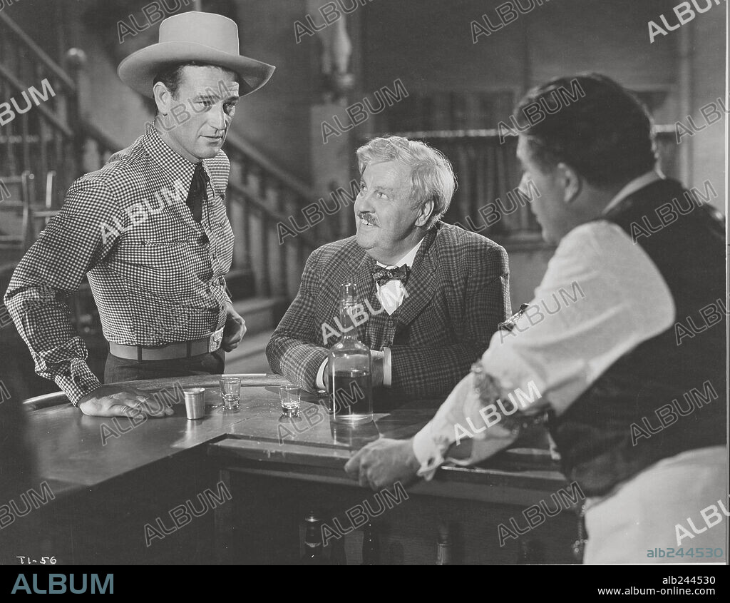 JOHN WAYNE en EL Y SU ENEMIGA, 1944 (TALL IN THE SADDLE). Copyright RKO.