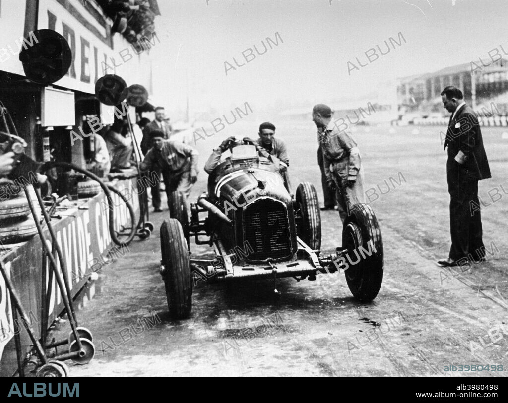 Italian Grand Prix, Monza, 1933. Luigi Fagioli in an Alfa Romeo in the pits. Fagioli won the race.