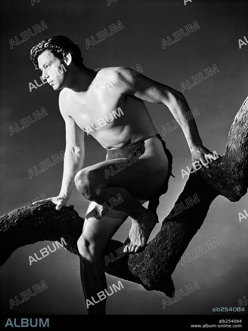JOHNNY WEISSMULLER in TARZAN AND HIS MATE, 1934, directed by CEDRIC GIBBONS. Copyright M.G.M.