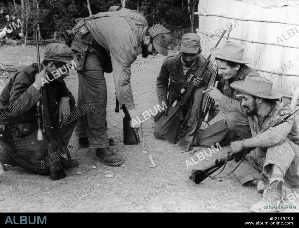 Ernesto Che Guevara, Fidel Castro Ruz, Calixto Garcia, Ramiro Valdes Menedez, And Juan Almeida Bosque At Sierra Maesta During The Cuban Revolution. (Photo by: Sovfoto/UIG via Getty Images).