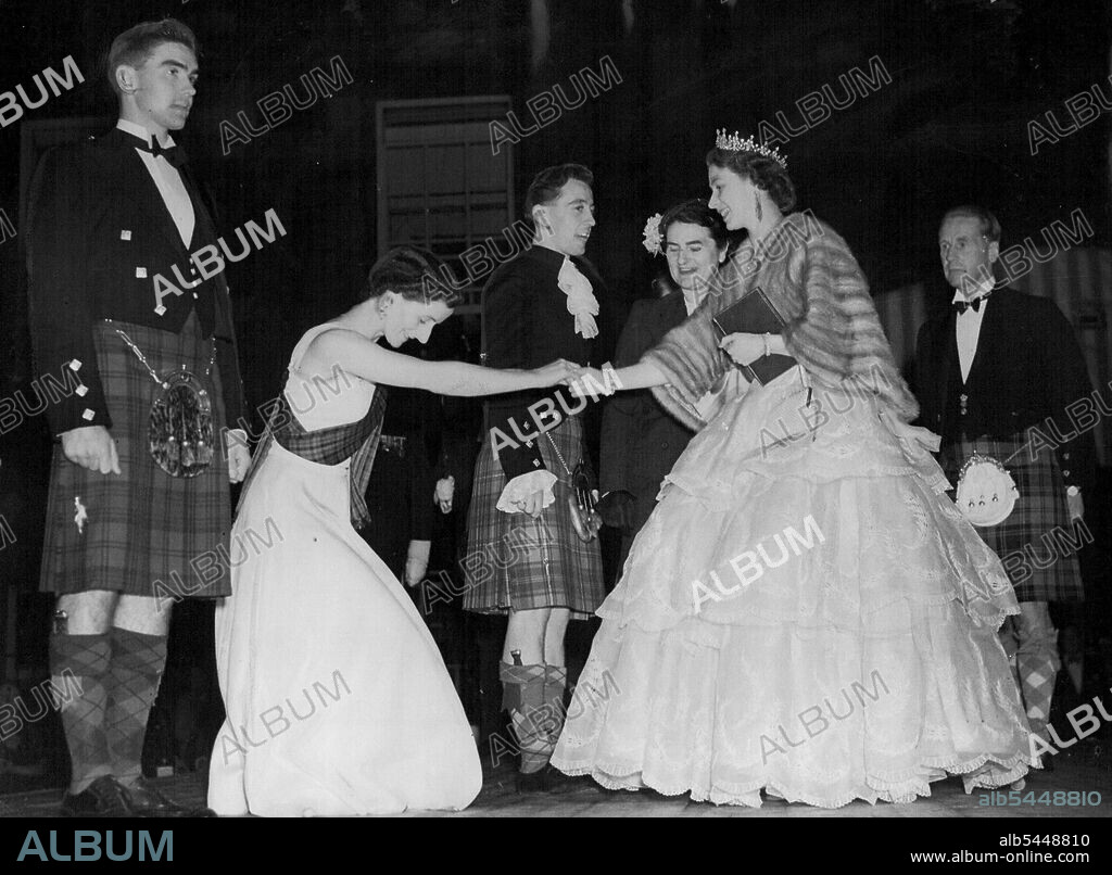 Scottish Dancers Presented To Queen -- Miss Allie Anderson presents country dancers to the Queen at the palace of Holyroodhouse during a concert held at the palace near Edinburgh on June 28. On the right is the Duke of Hamilton. Her Majesty is paying a six-day visit to Edinburgh. June 30, 1952.