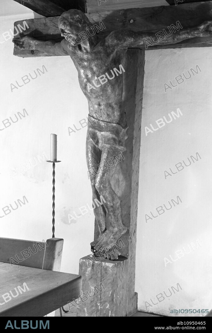 big wooden sculpture of Jesus Christ on the cross in Hartmannsberg castle, the residence of Hitler´s favoured sculptor Josef Thorak, Germany 1930s.