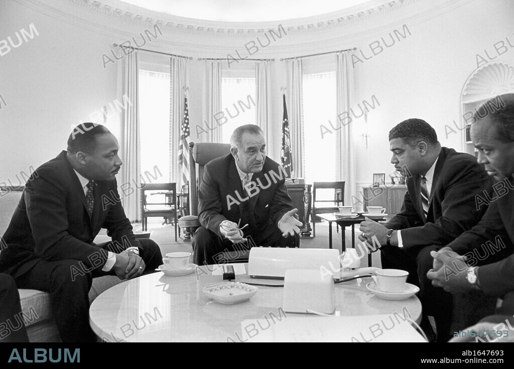 Lyndon Baines Johnson (1908-1973) 36th President of the United States in talks with Civil Rights leaders in the White House, including  Martin Luther King, Jr (1929-1968), left.