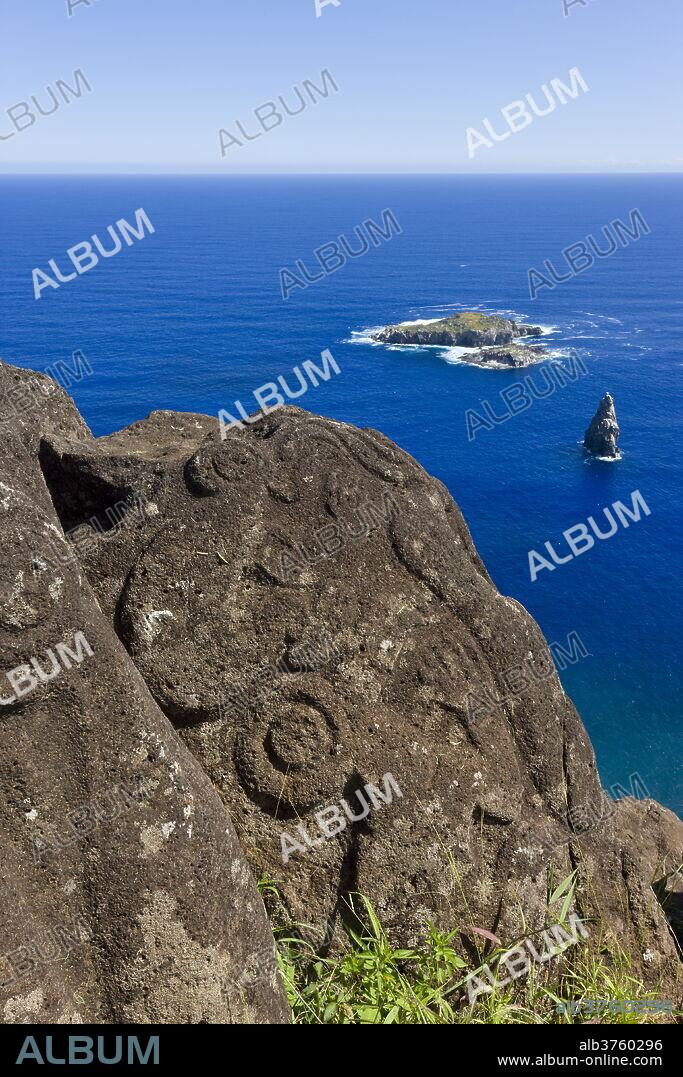 Petroglyphs at the archeological site of Orongo Ceremonial village high on the crater rim of Ranu Kau, Rapa Nui (Easter Island), UNESCO World Heritage Site, Chile, South America.