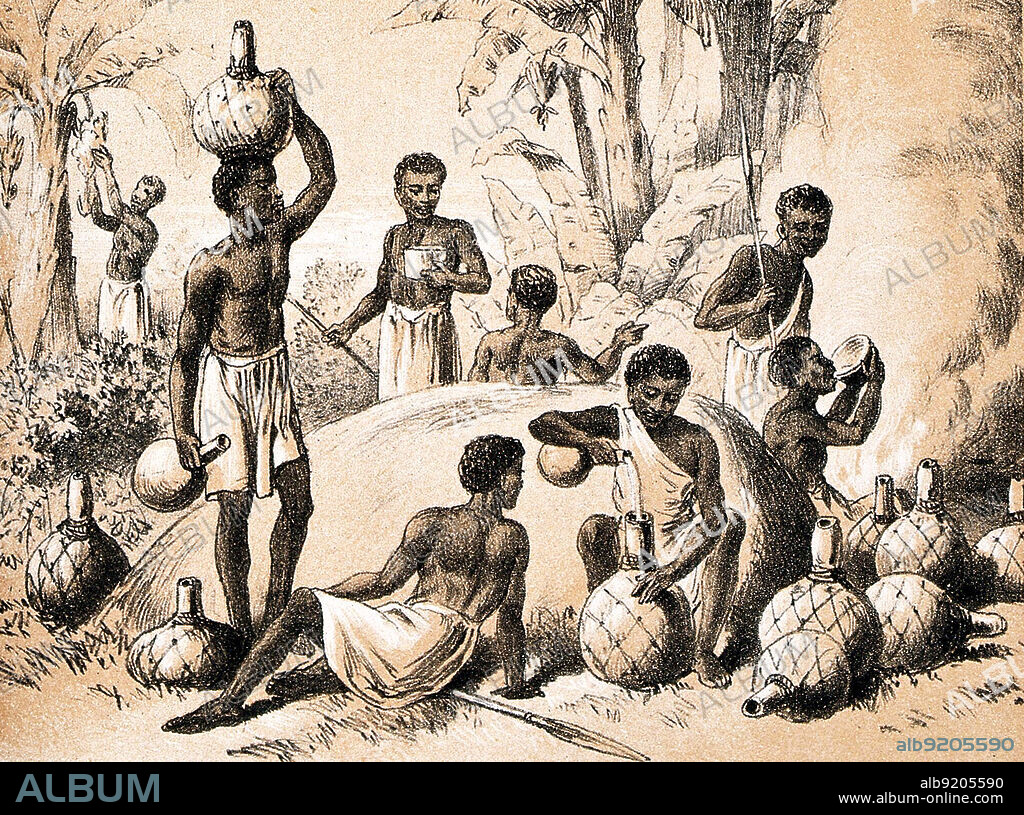 Africans brewing and drinking pombe. Millet beer, also known as Bantu beer, malwa, pombe "Tchouk" or opaque beer, is an alcoholic beverage made from malted millet that is common throughout Africa. In the southern parts of Africa is more commonly known as umqombothi. It is served in calabash gourds. Lithograph with tint plate, 19th C.