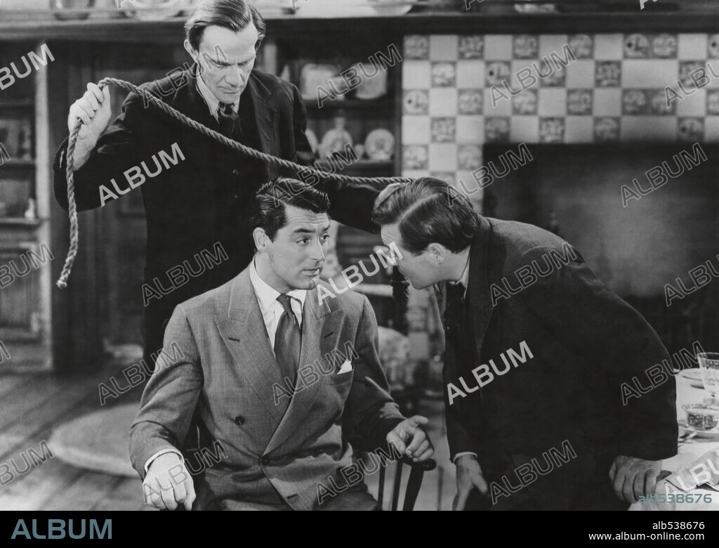 CARY GRANT, PETER LORRE and RAYMOND MASSEY in ARSENIC AND OLD LACE, 1944, directed by FRANK CAPRA. Copyright WARNER BROTHERS.