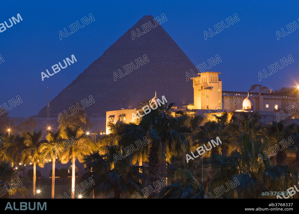The Great Pyramid , UNESCO World Heritage Site, and the Mena House Hotel in Giza at night, near Cairo, Egypt, North Africa, Africa.