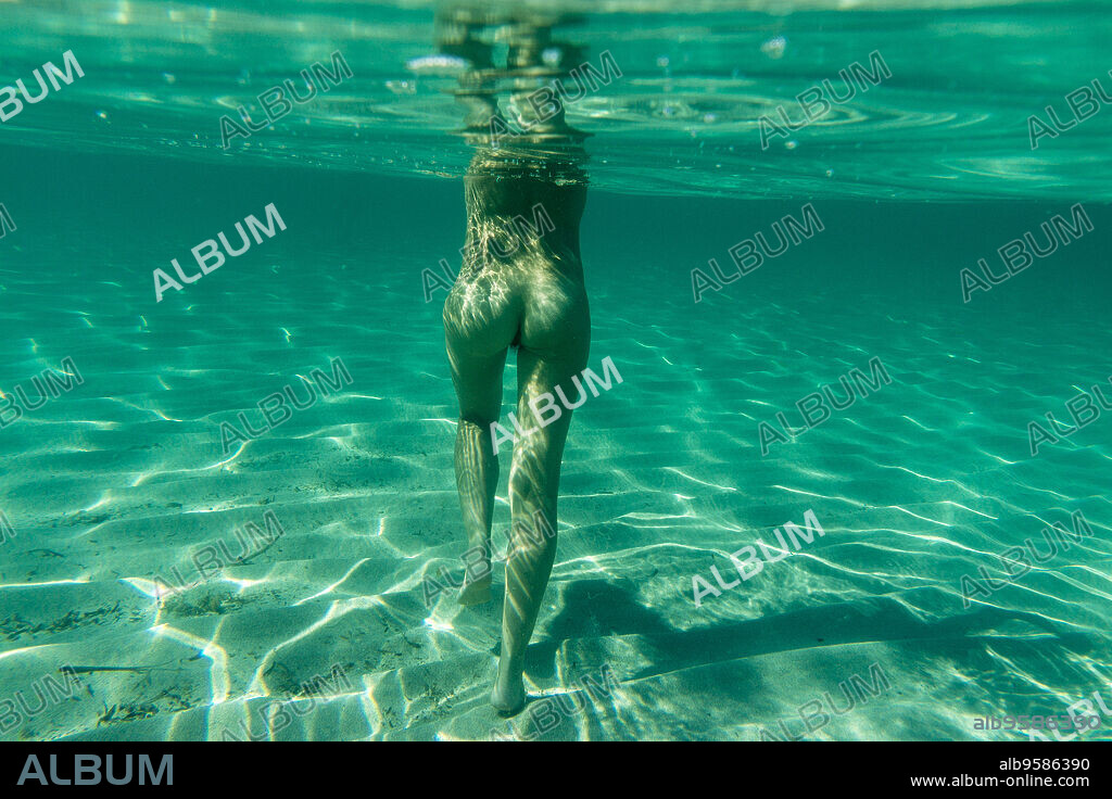 naked woman underwater, Cala Torta, Artá, Mallorca, balearic islands, spain, europe.