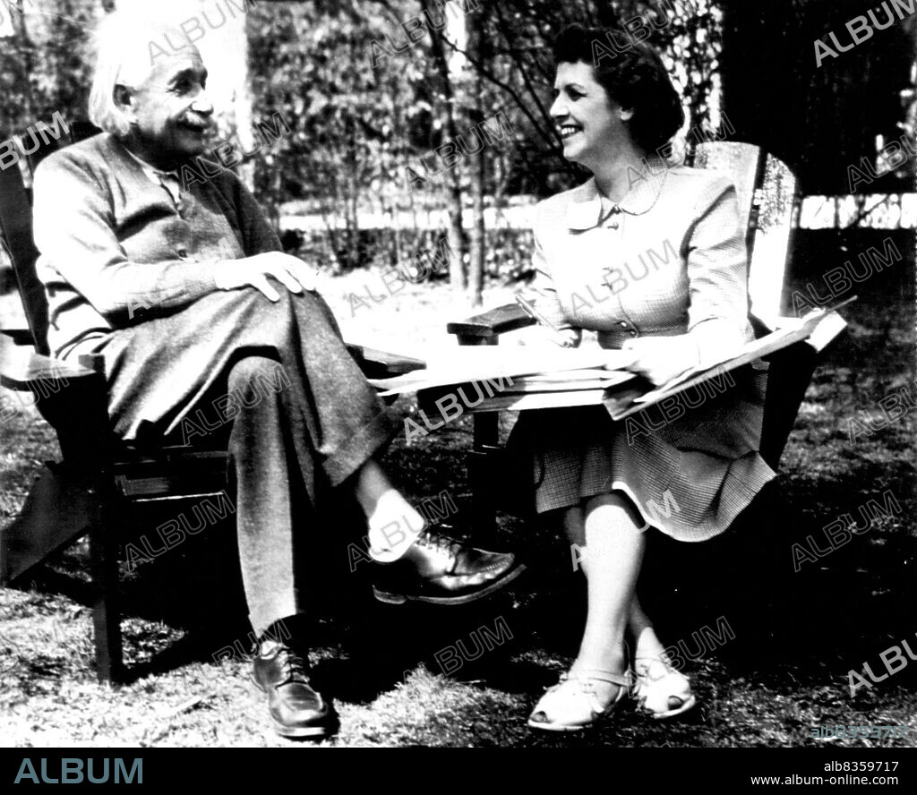 Knows All The Answers -- Professor Albert Einstein, world-famous Mathematician, Chatted amiably with census takes Mrs. Erna L. Cromwell this week at his home here as he joined everyone else in the nation in the question and answer sessions now underway. April 13, 1950. (Photo by AP Wirephoto).