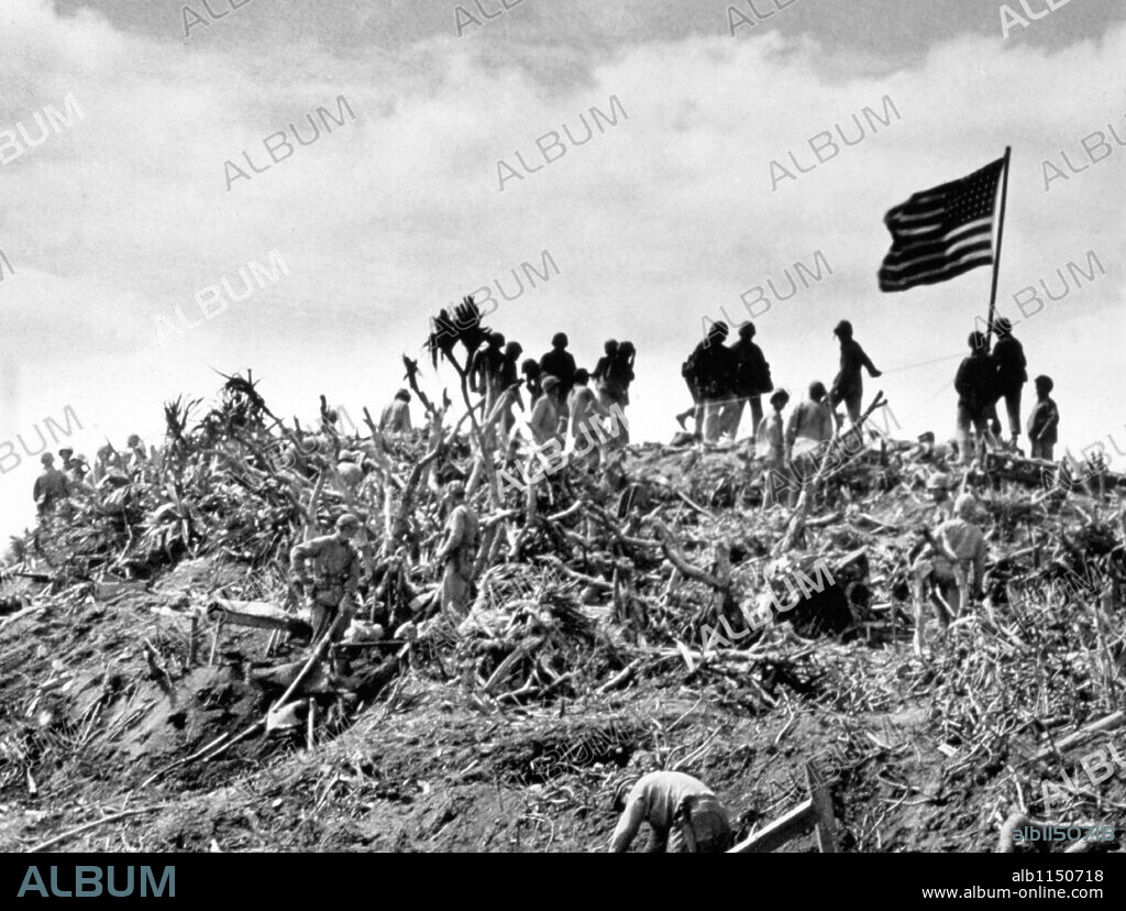 Marines plant the U.S. flag at mount Suribachi in the Iwo Jima island (Japan). Feb-March 1945.