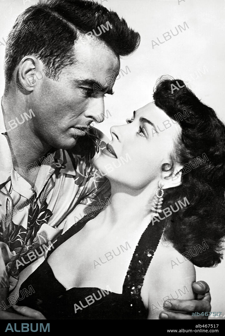 DONNA REED y MONTGOMERY CLIFT en DE AQUÍ A LA ETERNIDAD, 1953 (FROM HERE TO ETERNITY), dirigida por FRED ZINNEMANN. Copyright COLUMBIA PICTURES.