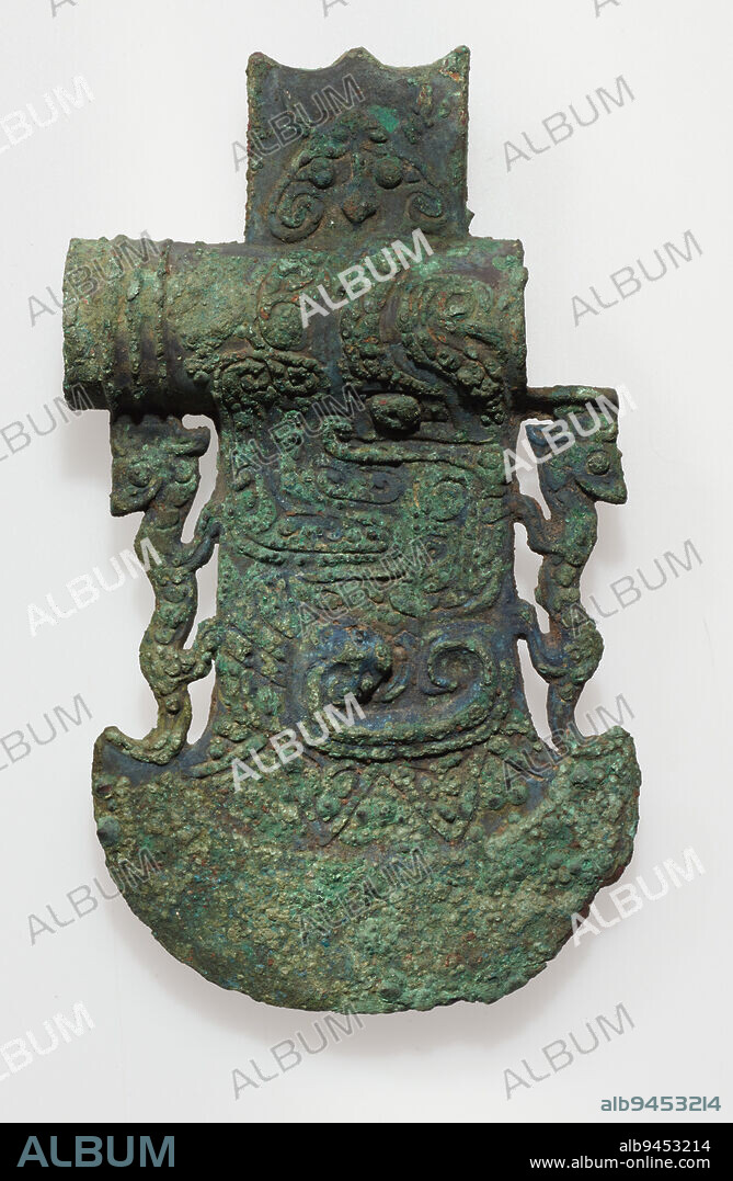 Axe with tubular socket, 11th-10th century BCE, 6 1/4 × 3 5/8 × 1 1/4 in., 0.9 lb. (15.88 × 9.21 × 3.18 cm, 0.4 kg), Bronze, China, 11th-10th century BCE.