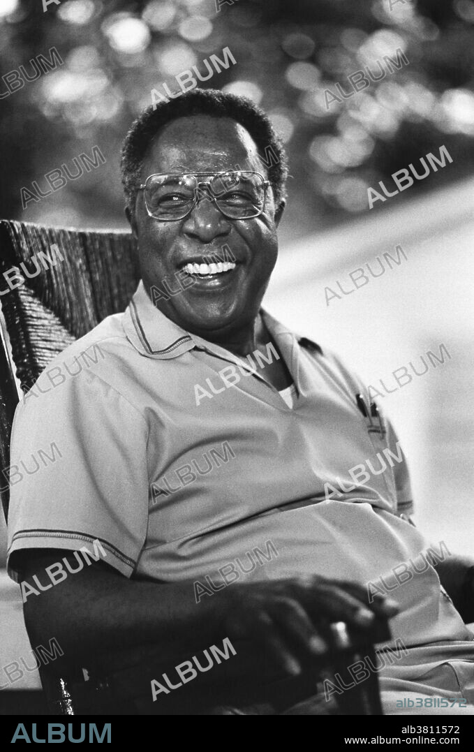 Haley, photographed at his boyhood home in Henning, Tennessee, circa 1980. Alexander Murray Palmer "Alex" Haley (August 11, 1921 - February 10, 1992) was an American writer known as the author of the 1976 book Roots: The Saga of an American Family. The book was adapted by ABC as a TV mini-series of the same name and aired in 1977 to a record-breaking 130 million viewers. It had great influence on awareness in the United States of African-American history and inspired a broad interest in genealogy and family history. His first book was 1965's The Autobiography of Malcolm X, a collaboration through numerous lengthy interviews with the subject, a major African-American leader. In the late 1970s, Haley had begun working on a second historical novel based on another branch of his family, traced through his grandmother Queen; she was the daughter of a black slave woman and her white master. He did not finish the novel before dying of a heart attack.at the age of 70. At his request, the novel was finished by David Stevens and was published as Alex Haley's Queen. It was subsequently adapted as a movie of the same name in 1993. In later years the validity of certain aspects of the book were questioned by scholars and critics but Haley retained both his Pulitzer and National Book Award.