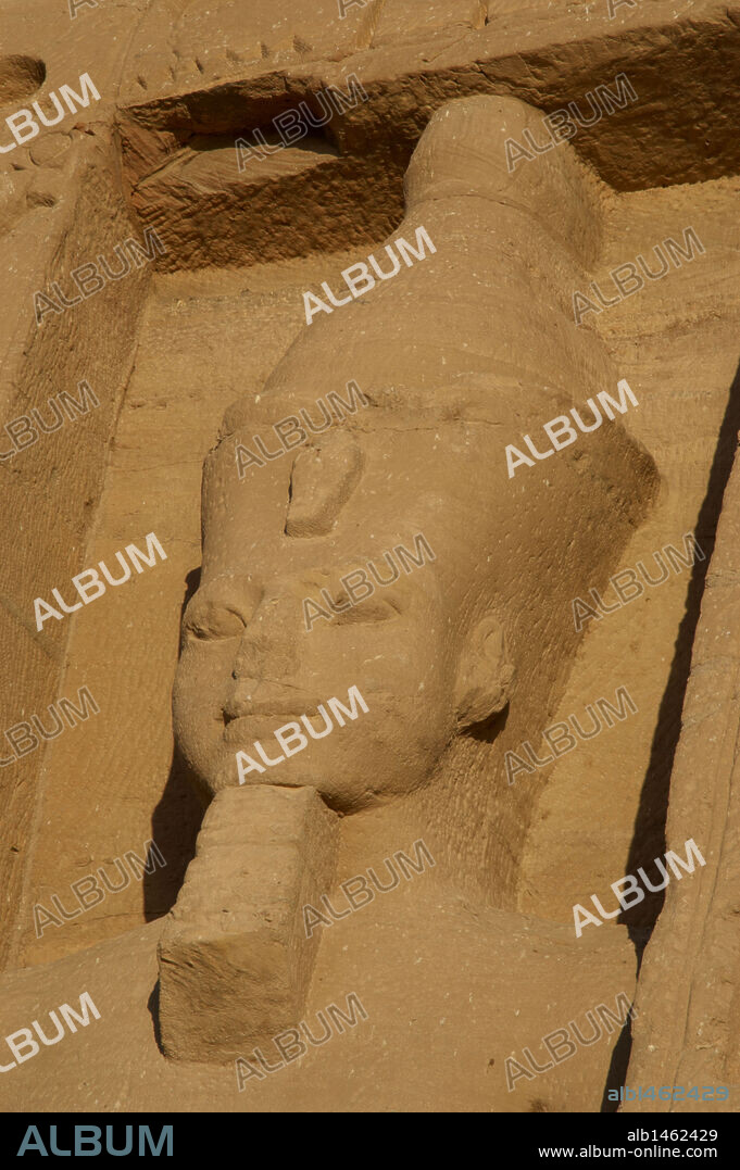Egyptian art. Temple of Hathor or Small Temple dedicated to Nefertari. Facade depicting the pharaoh Ramses II (1290-1224 BC) with double crown and false beard. 19th dynasty. New Kingdom. Abu Simbel. Egypt.