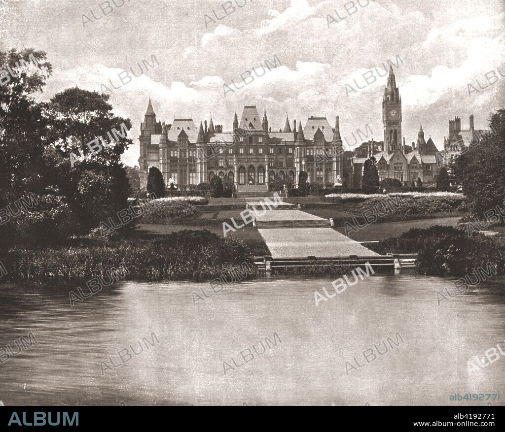 Eaton Hall, Eccleston, Cheshire, 1894. Eaton Hall was remodelled in the Gothic style in 1870-1882 by Alfred Waterhouse for the Duke of Westminster. From Beautiful Britain; views of our stately homes. [The Werner Company of Chicago, 1894].