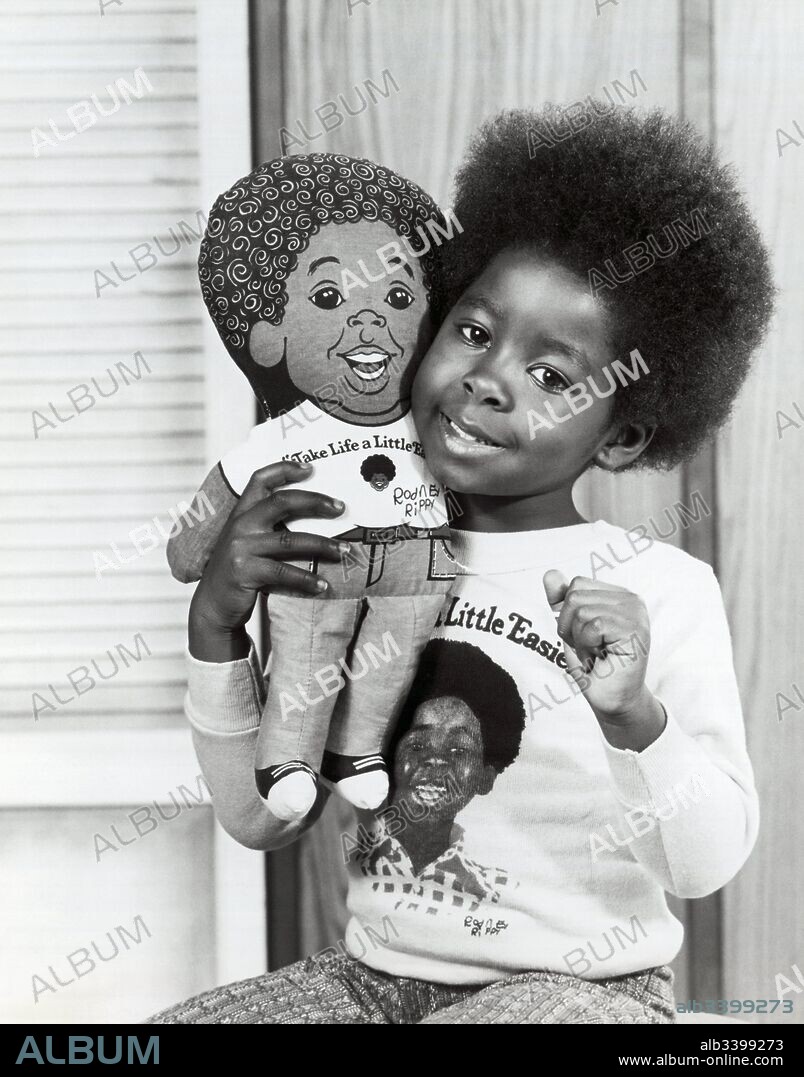Los Angeles, California:  1974 A young girl holds her talking Rodney Allen Rippy doll who is the namesake of television's newest star.
