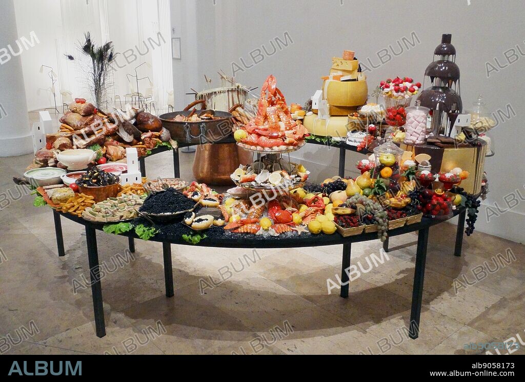 Sculpture titled 'Le Festin III' by Gilles Barbier (1965-) Ni-Vanuatu Contemporary artist. Oil painting on synthetic resin, cookware and table. Dated 2014.