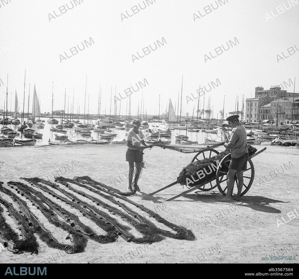 The fishing port in Cannes, French Riviera, September 1949.