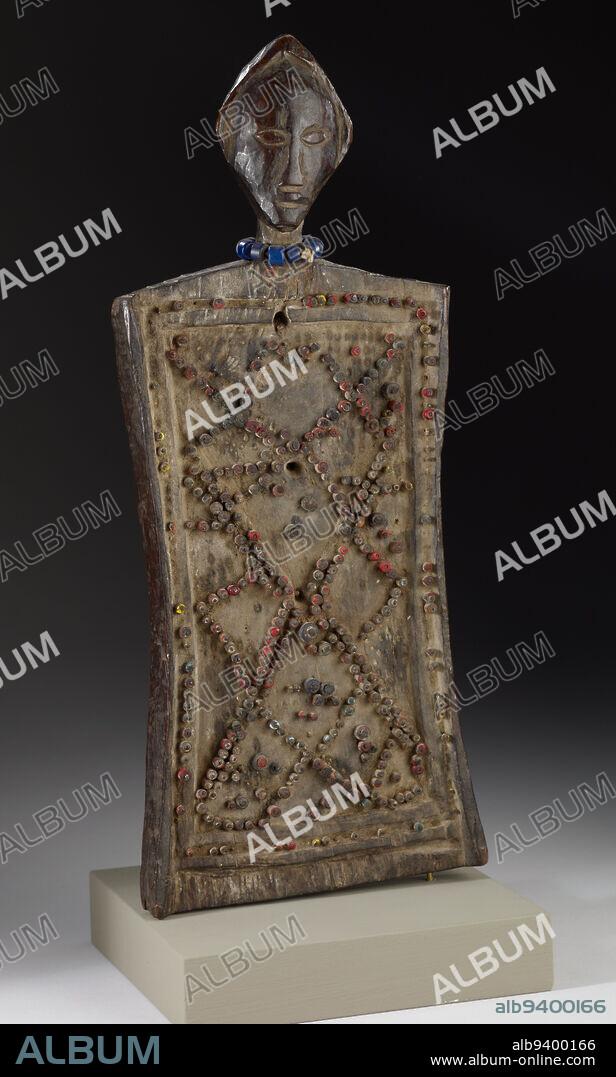 Lukasa (Memory Board), Second quarter of the 20th century, 13 1/2 x 5 7/8 x 1 1/2 in. (excluding attached base), Wood, metal, beads, string, Democratic Republic of the Congo, 20th century.