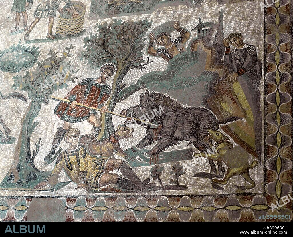 Mosaic in the Roman Villa of Casale, near Piazza Armerina, Sicily, Italy. Showing a man hunting a wild boar. The villa boasts the best collection of Roman mosaics in the world and is a UNESCO World Heritage Site.