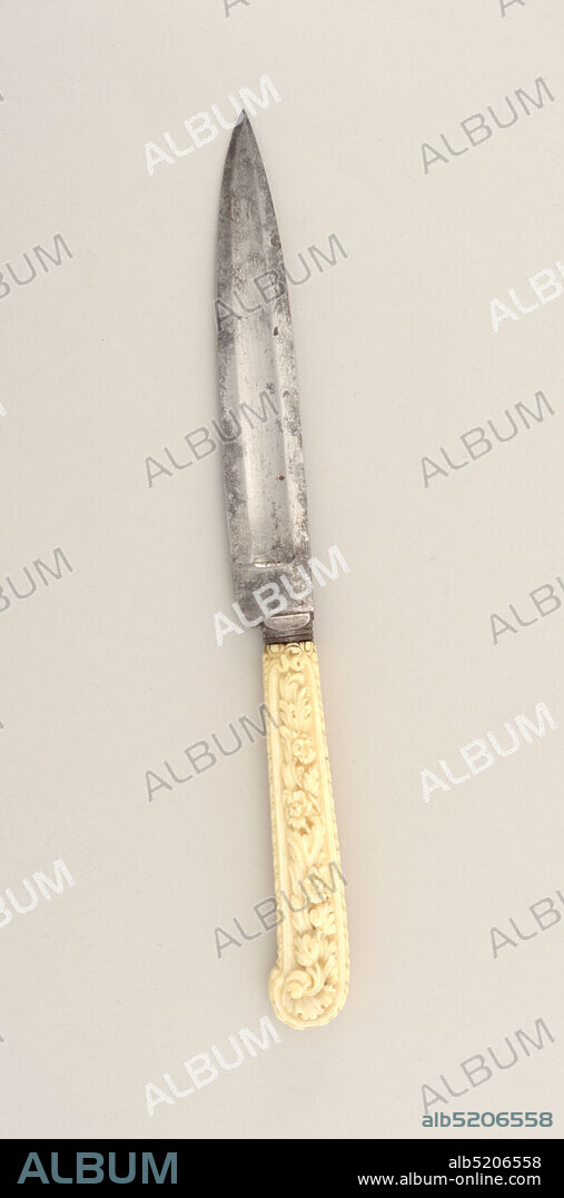 Knife, steel, ivory, Leaf-shaped blade, slightly hollow in the centre, plain bolster. Pistol- shaped carved ivory handle with floral decoration and a decorative pattern with leaves, beads and scrolls following the contours of the handle., probably France, ca. 1750, cutlery, Decorative Arts, Knife.