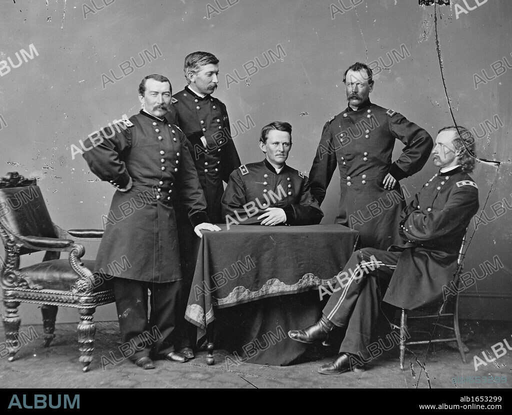 General Philip Sheridan (1831-1888), standing right, and his Staff officers during the American Civil War 1860-1865.  American Army officer and Union (Northern) general.