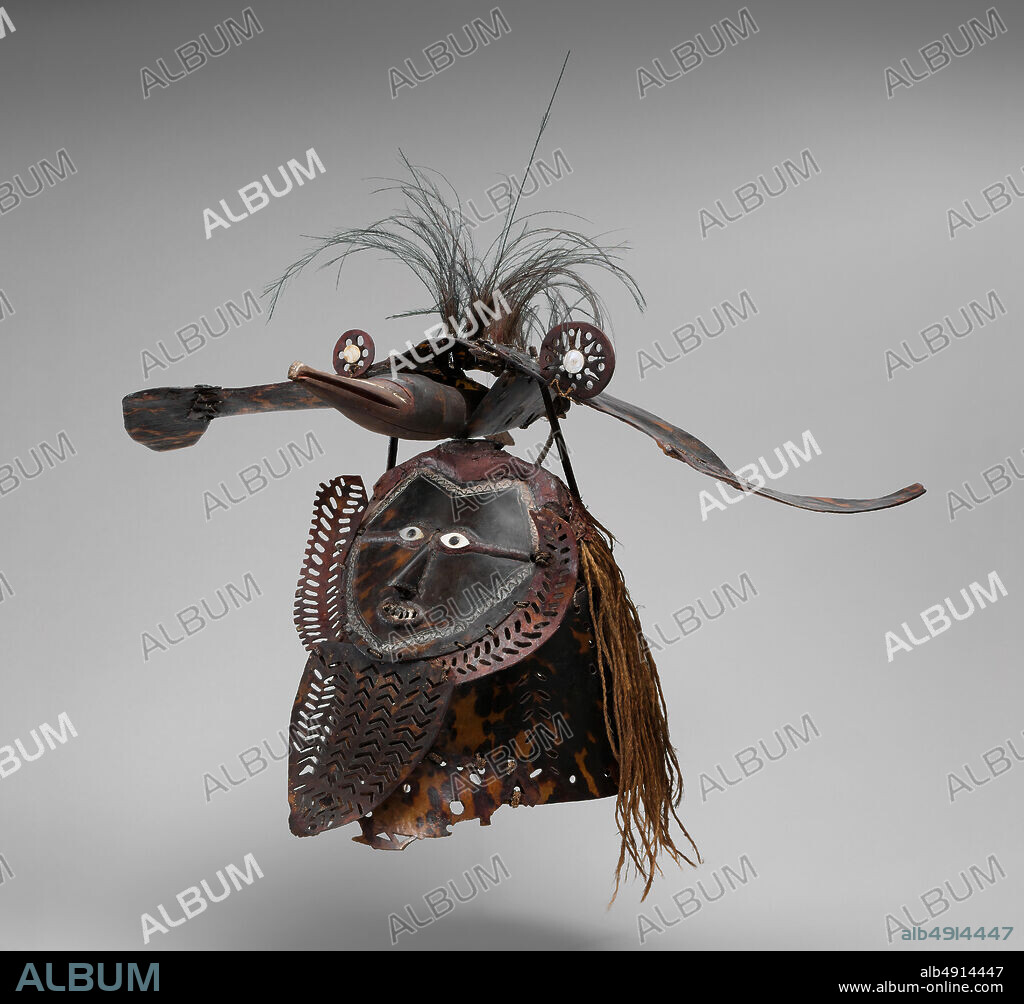 Mask (Buk, Krar, or Kara), Torres Strait Islander, mid to late 19th century, Australia, Mabuiag Island, Queensland, Torres Strait, Torres Strait Islander, Turtle shell, wood, cassowary feathers, fiber, resin, shell, paint, H. 21 1/2 x W. 25 x D. 22 3/4 in. (54.6 x 63.5 x 57.8 cm), Costumes.