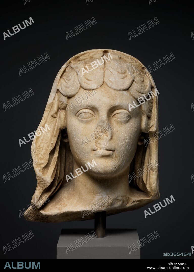 Marble portrait of the Empress Faustina the Younger, wife of the emperor Marcus Aurelius. Culture: Roman. Dimensions: H. 13 1/2 in. (34.3 cm). Date: ca. A.D. 161-180.
The well-formed but rather puffy features, the prominent eyes, and the deeply waved hair exemplify mid-Antonine standards of beauty and are identifying traits of this empress.