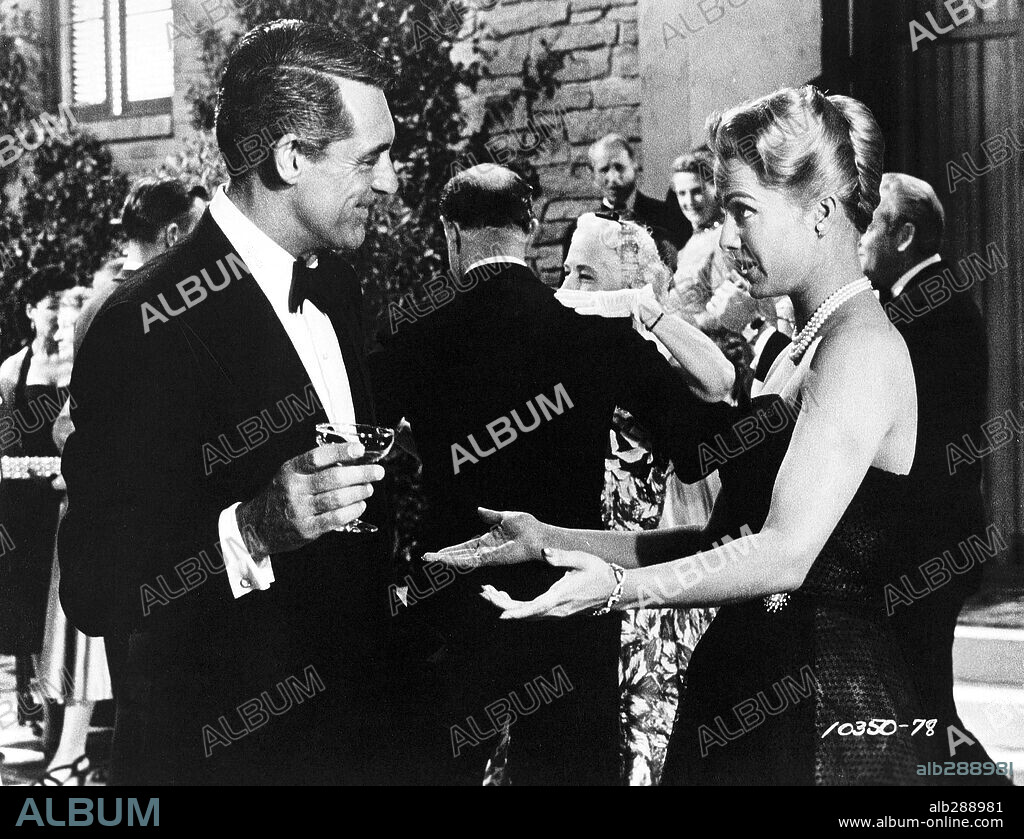 CARY GRANT and MARTHA HYER in HOUSEBOAT, 1958, directed by MELVILLE SHAVELSON. Copyright PARAMOUNT PICTURES.