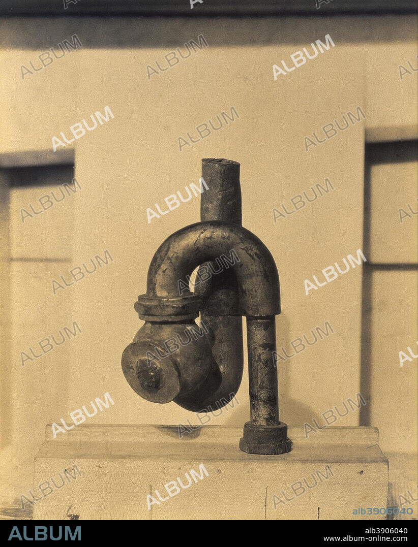 MORTON LIVINGSTON SCHAMBERG. "God" By Baroness Elsa von Freytag-Loringhoven and Morton Schamberg. Date/Period: 1917. Gelatin silver print. Width: 18.8 cm. Height: 23.5 cm (sheet).