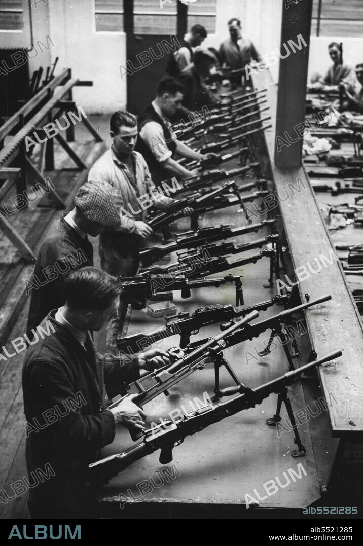 Making Bren Guns For Britain's New Army -- Final inspection of finished Bren Guns.The Royal Small Arms Factory at Enfield is now rushing through orders for thousands of Bren guns, following the introduction of conscription in this country. May 1, 1939. (Photo by Keystone).