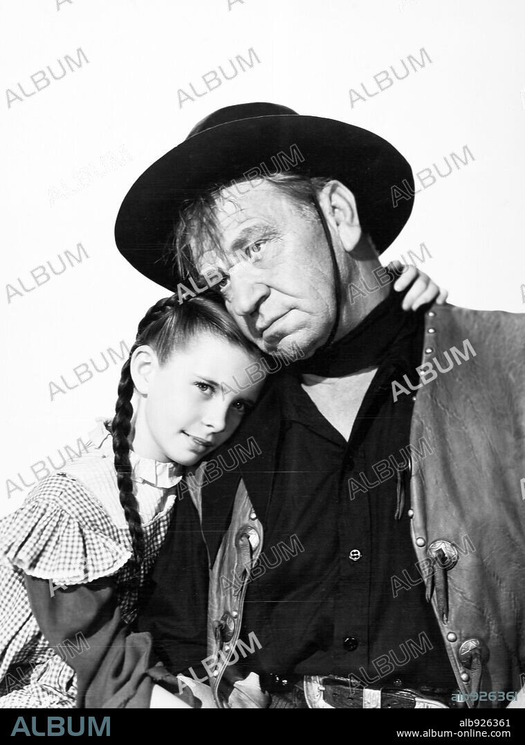 MARGARET O'BRIEN and WALLACE BEERY in BAD BASCOMB, 1946, directed by S. SYLAN SIMON. Copyright M.G.M.