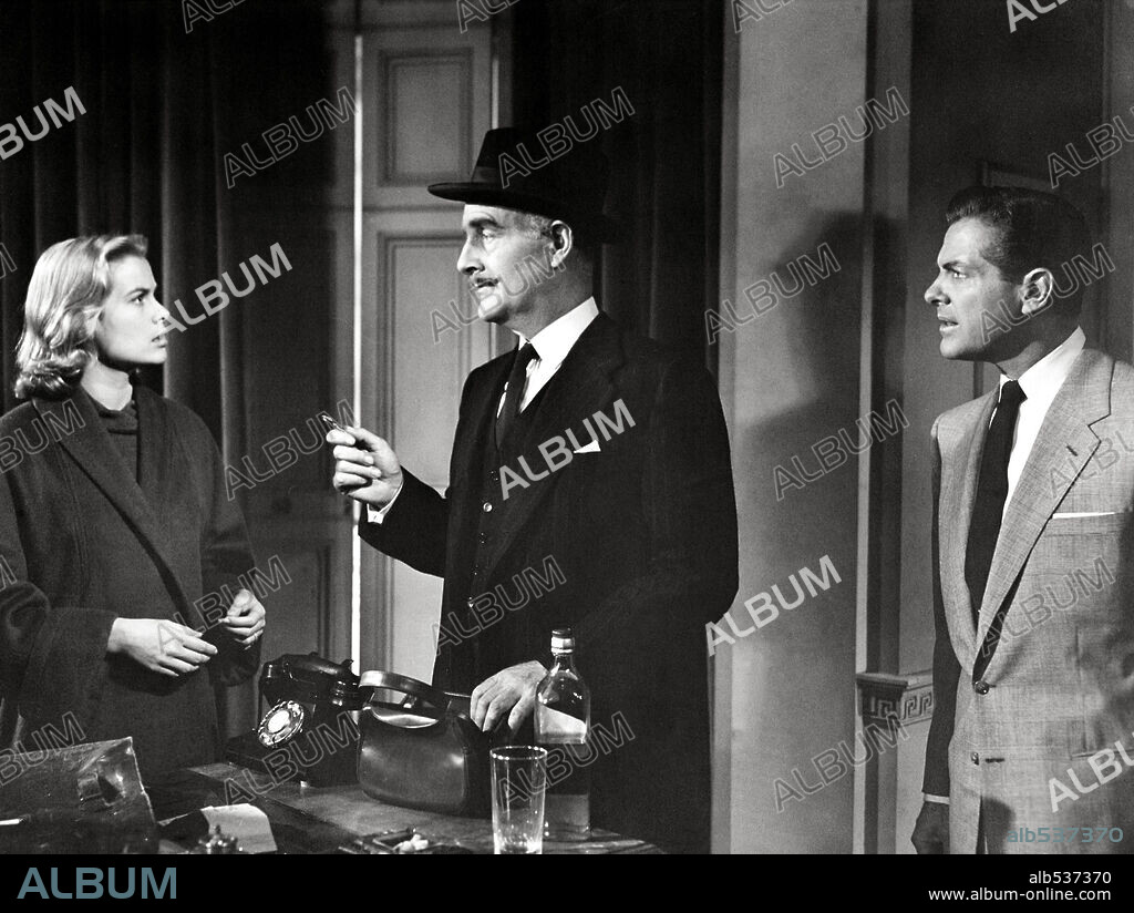 GRACE KELLY, JOHN WILLIAMS y ROBERT CUMMINGS en CRIMEN PERFECTO, 1954 (DIAL M FOR MURDER), dirigida por ALFRED HITCHCOCK. Copyright WARNER BROS.