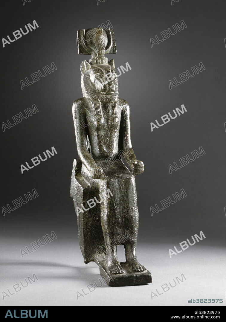 Bronze figurine of the Egyptian Goddess Wadjet, Egypt, 26th Dynasty (664 - 525 BC). Wadjet, known to the Greek world as Uto or Buto, was originally the ancient local goddess of the city of Dep (Buto), a city that was an important site in the Predynastic era of Ancient Egypt and the cultural developments of the Paleolithic. She was said to be the patron and protector of Lower Egypt and upon unification with Upper Egypt, the joint protector and patron of all of Egypt with the goddess of Upper Egypt. The image of Wadjet with the sun disk is called the uraeus, and it was the emblem on the crown of the rulers of Lower Egypt. She was also the protector of kings and of women in childbirth. As the patron goddess, she was associated with the land and depicted as a snake-headed woman or a snake, usually an Egyptian cobra. Sometimes she was depicted as a woman with two snake heads and, at other times, a snake with a woman's head.