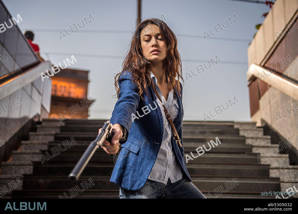 OLGA KURYLENKO in THE NOVEMBER MAN, 2014, directed by ROGER DONALDSON. Copyright DAS FILMS.