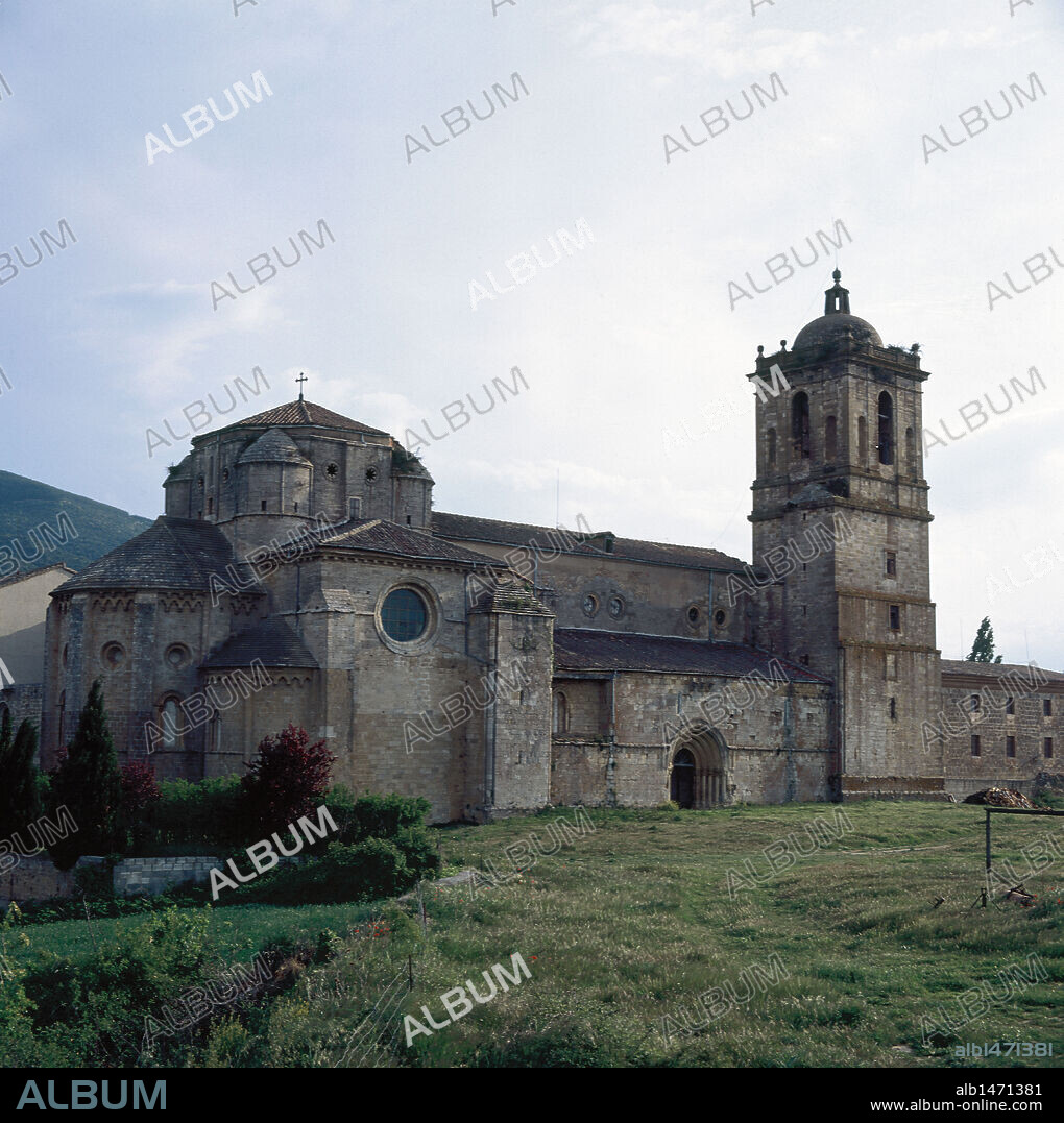 Monastery of Royal Saint Mary of Irache (Iratxe). Benedictine building built trhough different periods: Romanesque church (12th century), plateresque cloister and tower in the Herrerian style. Ouside view. Ayegui. Navarra. Spain.