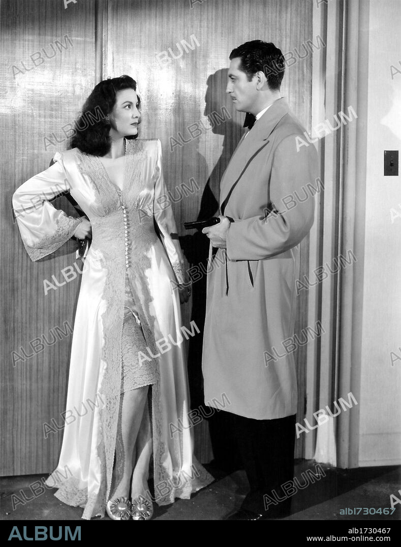 LUIS ALDAS and MARIA FELIX in LA DEVORADORA, 1946. Copyright PRODUCCIONES GROVAS.