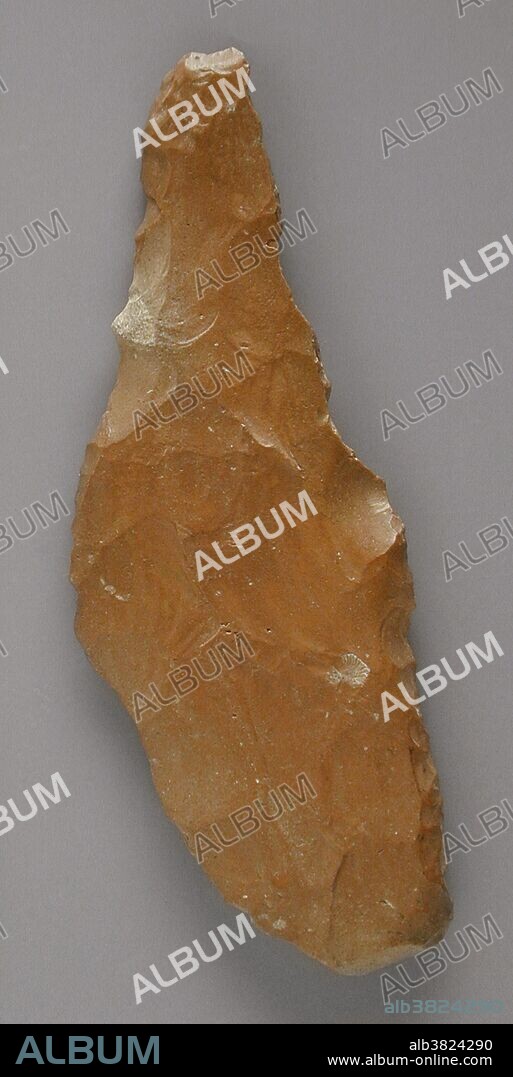 Egyptian flint, Neolithic Period (5500 - 3100 BC). A hand axe or biface is a prehistorical stone tool with two faces, and the longest-used tool in human history. Its technical name (biface) comes from the fact that the archetypical model is a generally bifacial Lithic flake with an almond-shaped morphology. The most common hand axes have a pointed end and rounded base, which gives them their characteristic shape, and both faces have been knapped to remove the natural cortex, at least partially.