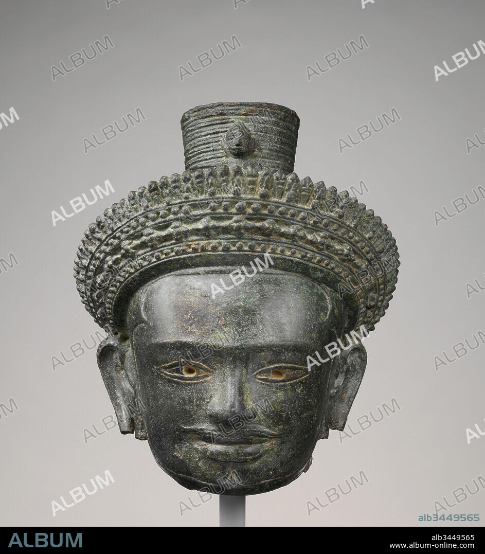 Head of Avalokiteshvara, the Bodhisattva of Infinite Compassion, Angkor period, ca. third quarter of the 10th century, Cambodia, Bronze, H. 6 1/4 in. (15.9 cm); W. 5 1/2 in. (14 cm), Sculpture.
