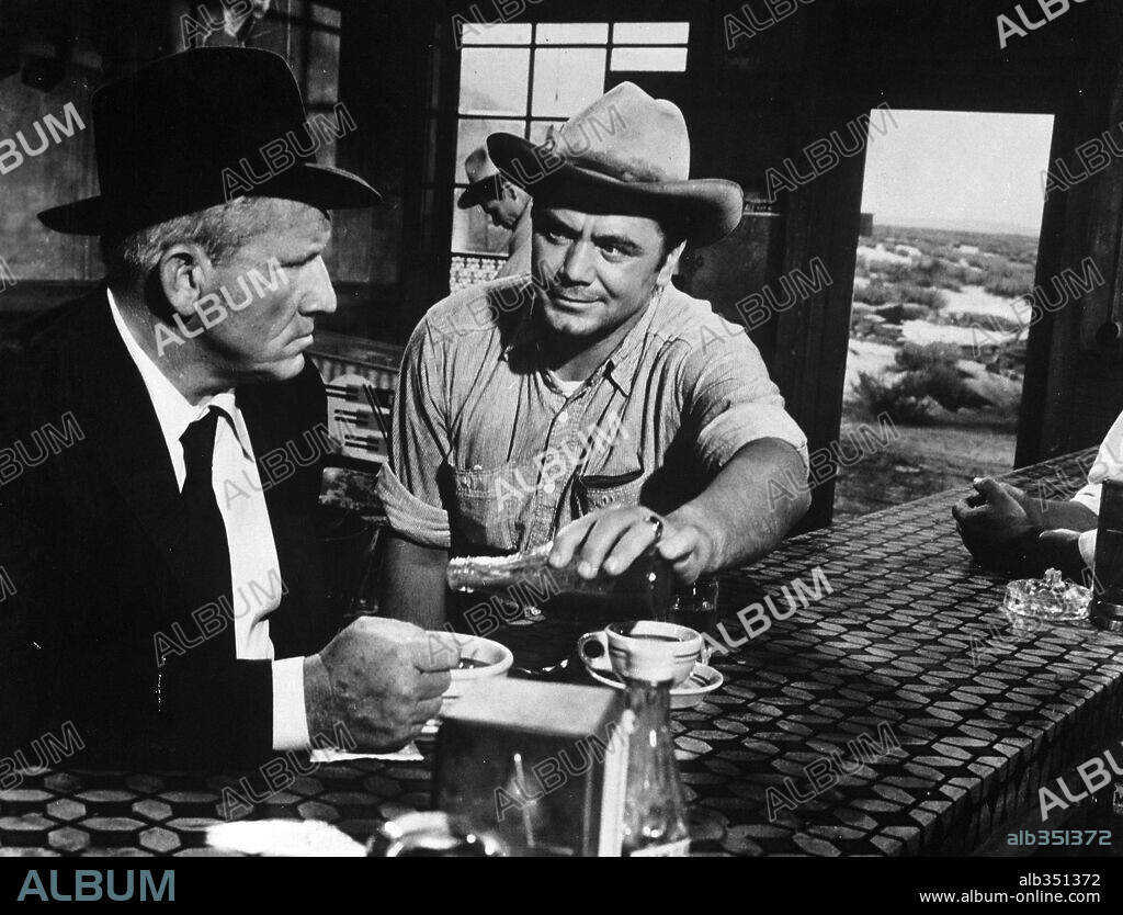 ERNEST BORGNINE and SPENCER TRACY in BAD DAY AT BLACK ROCK, 1955, directed by JOHN STURGES. Copyright M.G.M.