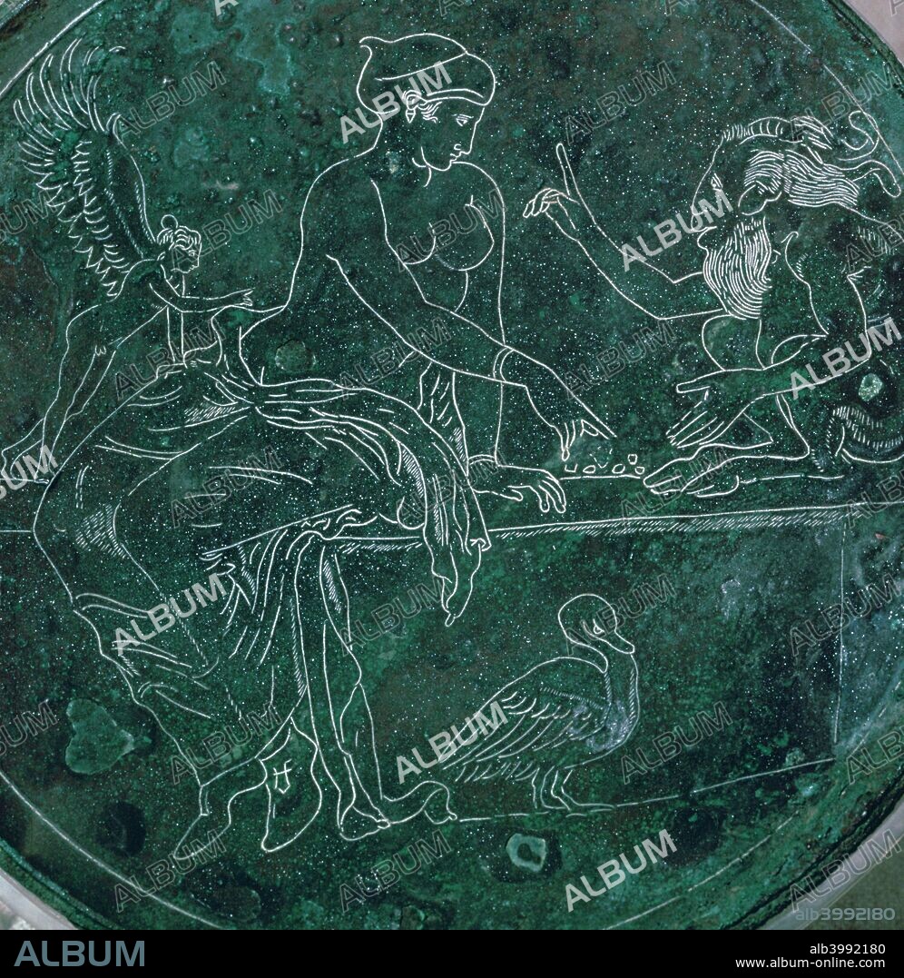 Close-up of a Greek bronze mirror-back, showing Aphrodite and Pan playing knuckle-bones, from the British Museum's collection.