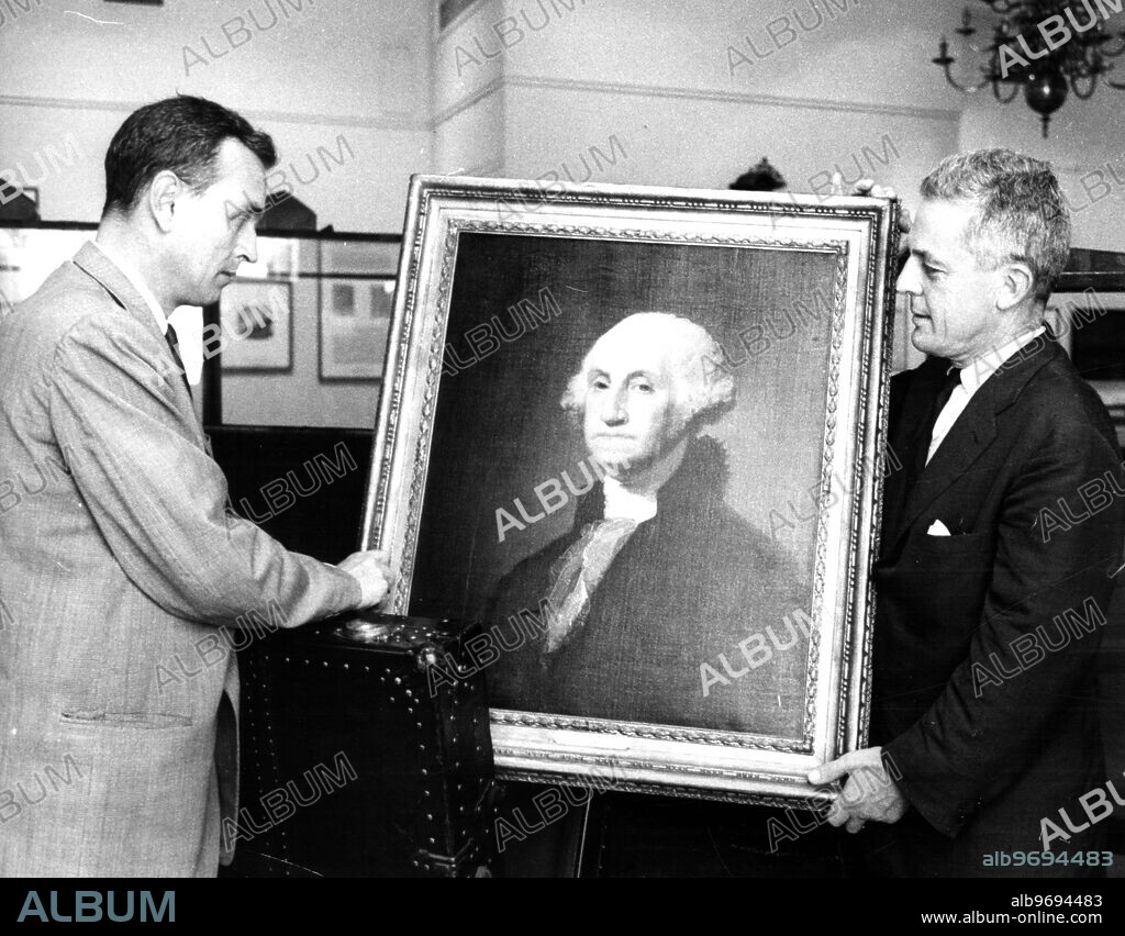 K.Ross Toole (left) director of the Museum of the City of New York, and Dudley Wood (right) trustee of the museum, prepared to package a portrait of George Washington, a painting by Gilbert Stuart, to be sent to the Soviet Union for exhibition at the Moscow Fair. 22 July 1959.