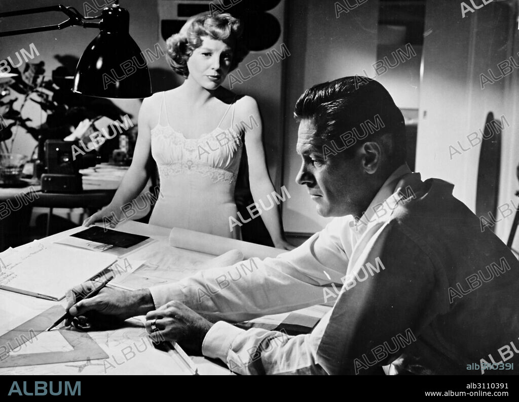 JUNE ALLYSON and WILLIAM HOLDEN in EXECUTIVE SUITE, 1954, directed by ROBERT WISE. Copyright M.G.M.