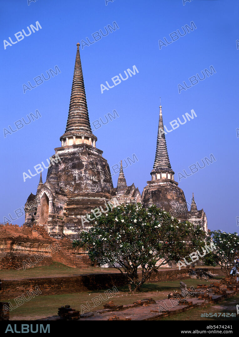 Wat Phra Si Sanphet was built around 1448 during the reign of King Borommatrailokanat, also known as Somdet Phra Ramesuan Boromma Trailokanat Bopit (1431–1488) who was the king of Ayutthaya from 1448 to 1488. Ayutthaya (Ayudhya)) was a Siamese kingdom that existed from 1351 to 1767. Ayutthaya was friendly towards foreign traders, including the Chinese, Vietnamese (Annamese), Indians, Japanese and Persians, and later the Portuguese, Spanish, Dutch and French, permitting them to set up villages outside the city walls. In the sixteenth century, it was described by foreign traders as one of the biggest and wealthiest cities in the East. The court of King Narai (1656–1688) had strong links with that of King Louis XIV of France, whose ambassadors compared the city in size and wealth to Paris.